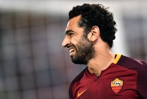 Roma's Egyptian midfielder Mohamed Salah celebrates after scoring during the friendly football match between Roma andValencia on August 14, 2015 at the Olympic stadium in Rome. AFP PHOTO / ALBERTO PIZZOLI