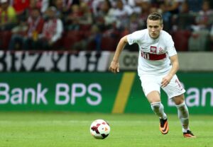 06.09.2013 WARSZAWA , STADION NARODOWY ( WARSAW NATIONAL STADIUM ) PILKA NOZNA ( FOOTBALL ) ELIMINACJE MISTRZOSTW SWIATA 2014 GRUPA H ( WORLD CUP 2014 QUALIFICATION POOL H ) MECZ POLSKA - CZARNOGORA ( GAME POLAND - MONTENEGRO ) NZ PIOTR ZIELINSKI  FOTO MATEUSZ TRZUSKOWSKI/CYFRASPORT