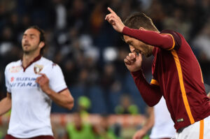 Roma's forward from Italy Francesco Totti celebrates his second goal during the Italian Serie A football match between AS Roma and Torino on April 20, 2016 at the Olympic stadium in Rome. / AFP / GABRIEL BOUYS (Photo credit should read GABRIEL BOUYS/AFP/Getty Images)